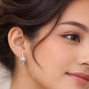 Palm Spark Silver Huggie Earrings