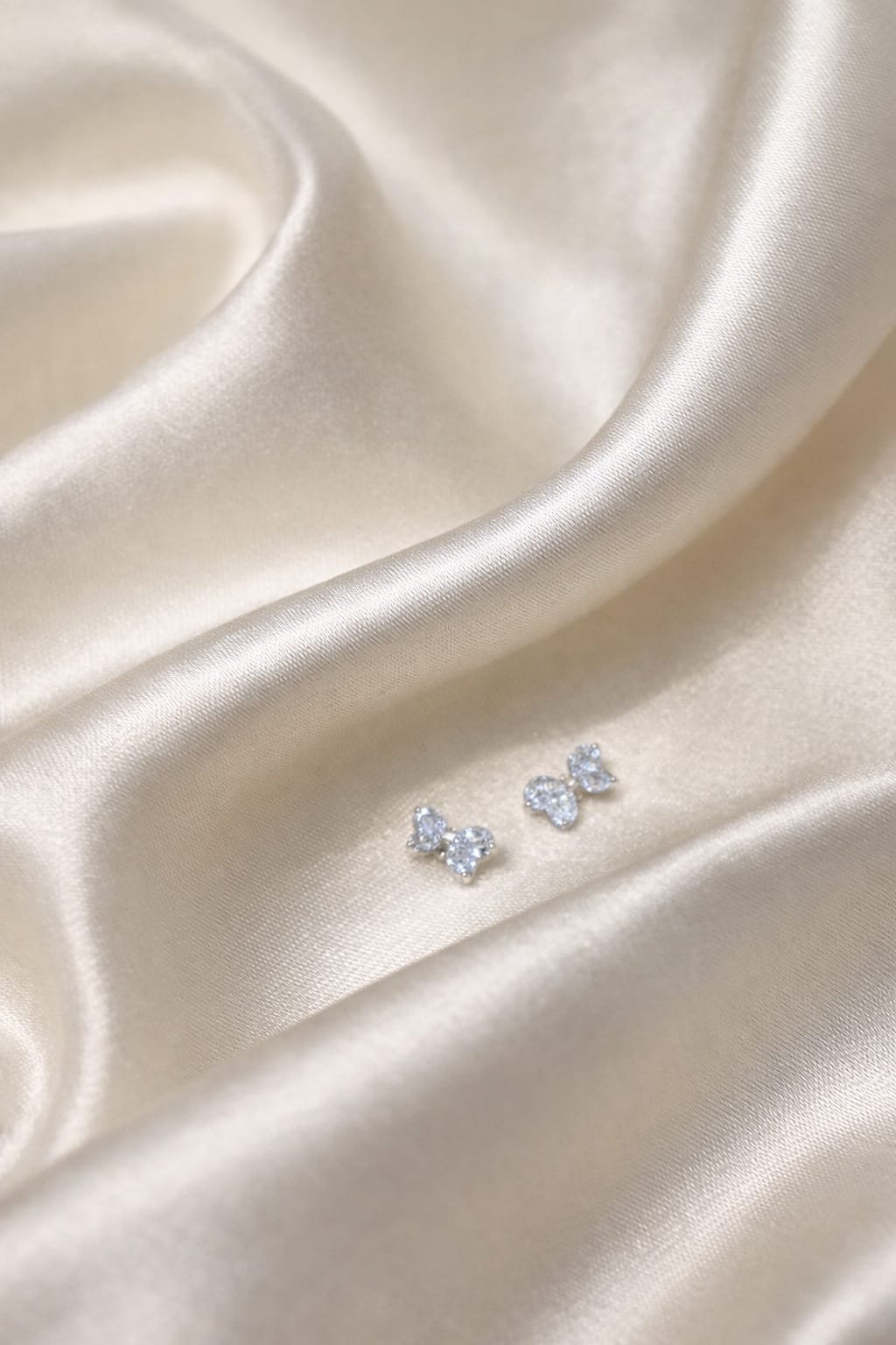 Twin Heart Sparkle Silver Stud Earrings - Image 2